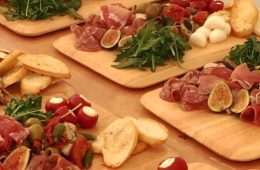 Antipasti on wooden serving boards